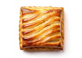 A pastry with a wavy pattern on top photo