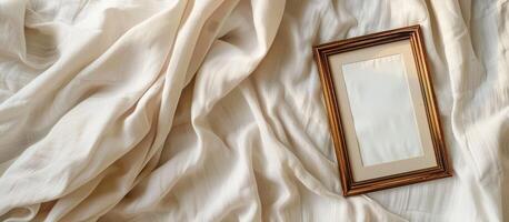 Retro Frame on Soft Linen evokes Quiet Luxury, Vintage Aesthetic, and Timeless Elegance with Warm Light and Neutral Texture. photo