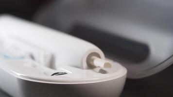 Exploring a modern dental care device at a home setting video