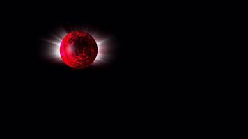 A bright red bowling ball rolls towards us, sparkling and spinning. video