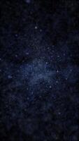 Flying at hyperspace warp speed through a tunnel of glowing blue stars and particles in outer space. Galaxy starburst motion background. Full HD and looping vertical animation. video