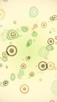 Abstract retro background with brown and green circles and squiggles. This vintage vertical background animation is full HD and looping. video
