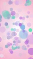 Colorful abstract background animation with gently flickering pastel colored circles. This cute vertical motion background is full HD and a seamless loop. video