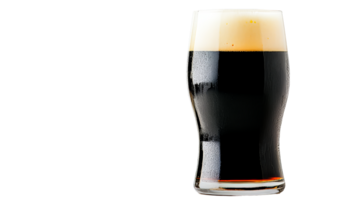 Dark beer with foam in glass on black background, cut out transparent png