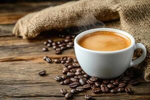 steaming cup of coffee sits on rustic wooden table, surrounded by scattered coffee beans and burlap sack, evoking warm and inviting atmosphere photo