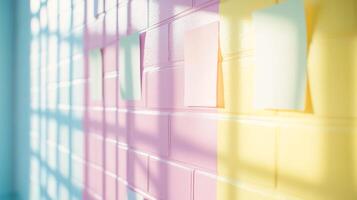 Closeup Blank pastel color sticky notes on brick pastel colorful wall. Prepare for workshop design thinking user experience designer photo