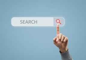Search Concept with Hand Clicking on Search Bar, Representing Online Search, Digital Exploration, and Information Retrieval photo