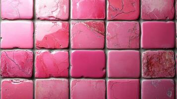 Pink decorative tiles arranged in an artistic pattern on a neutral background create a vibrant visual display in interior design photo