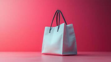 Stylish tote bag displayed against a vibrant pink background showcasing modern design and simplicity photo