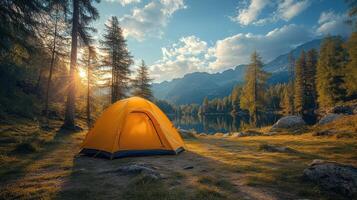 Camping by a serene lake at sunrise near majestic mountains with a bright orange tent in a tranquil forest setting photo