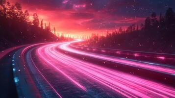 Vivid sunset illuminates a winding highway with vibrant lights during twilight photo