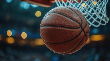 Basketball soaring towards the hoop during an intense game in a packed arena at night photo