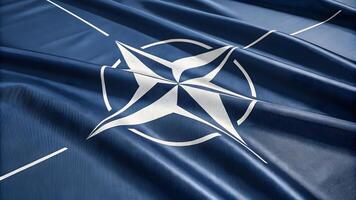 Realistic 3D render of NATO flag with glossy fabric texture international symbol of unity and security photo