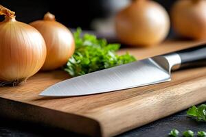 Sharp knife lying on wooden cutting board with onions and parsley photo