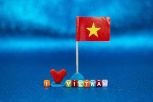 Bright display of love for Vietnam with colorful letters and flag, showcasing creativity and patriotic sentiment photo