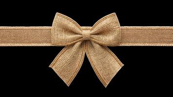 A decorative bow made of burlap ribbon photo