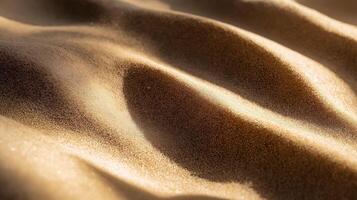 Sandy beach with a wave pattern. The sand is brown and the waves are small. The beach is empty photo