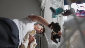A Dynamic Scene Featuring Laundry Sorting in a Bright, Cheerful Room Full of Light video