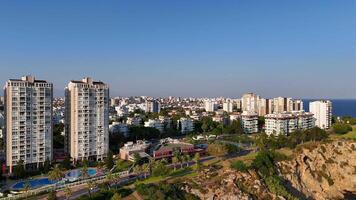 Antalya, Turkey 04.18.2025 Aerial View of Seaside City with Cliffs and Ocean video