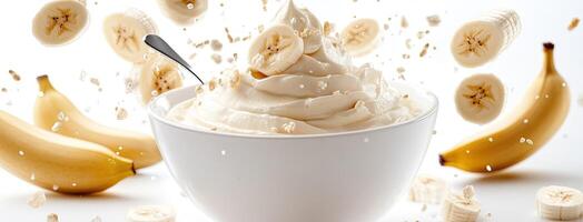 Banana smoothie with whipped cream and banana slices photo