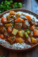 Delicious classic beef stew with rice, potatoes, carrots, and celery, garnished with fresh parsley photo