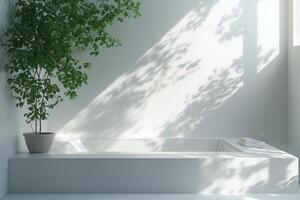 A white bathroom with a potted plant in the corner photo