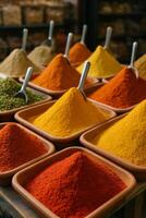 A variety of spices in bowls photo