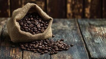 Coffee Beans Overflowing From Burlap Sack on Rustic Wooden Table photo