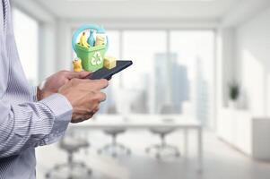 Man Holding Smartphone with Recycling Concept in Modern Office Setting photo