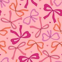 Simple seamless pattern with peach, orange and pink bows. graphics. vector