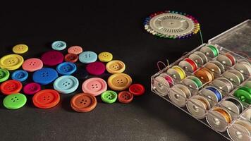 Colored Thin Spools of Thread Needles Colorful Buttons and Scissors and Measurement 01 video