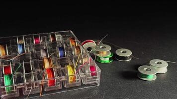 Colored Thin Spools of Tailor Thread 01 video