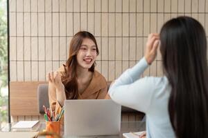 Study Session and Learning Environment. Students engaging in an interactive discussion during a study session at a modern cafe. photo