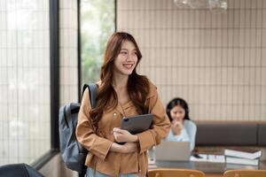 Student Life and Motivation. A student enters a bright study space, ready for productive learning and networking. photo