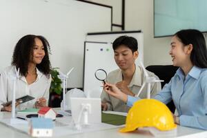 Sustainability and Collaboration. A group of professionals discussing sustainable design and ESG strategies. photo
