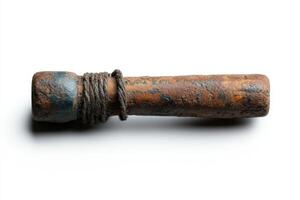 Rusty handmade tool with a wooden handle and twine wrapped around it photo