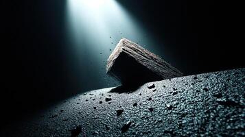 Dark abstract scene with a spotlight on a floating rock in a mysterious setting photo