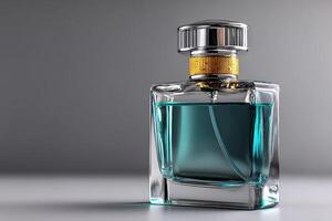 Elegant glass perfume bottle with a golden cap showcasing a blue fragrance in a minimalist setting photo