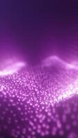 Digital purple glowing wave of particles with soft depth of field. Futuristic data or energy flow visual video