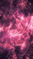 Abstract glowing pink plasma texture with dynamic, molten-like swirls and deep contrasting shadows, creating a fiery and fluid appearance video