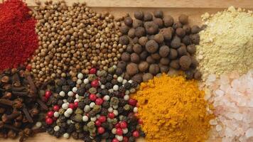 Assorted aromatic, natural and fragrant spices. Different variations of spicy and spicy Indian and oriental spices for seasoning food. video