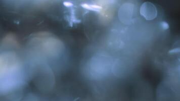 Abstract blurred background with a boke effect. Refraction of light from a crystal. Background animation is a flash of light. the effect of soft, unfocused, flickering light streams video