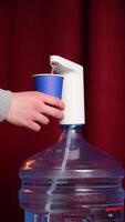Using water pump to fill paper cup video