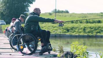 Group of Fishermen with Disabilities at Lakeside Dock video