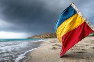 Flag stands on sandy beach under dark storm clouds in coastal area photo