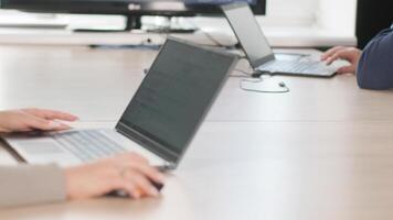 Office workers typing on laptops video