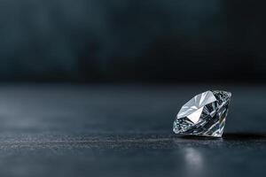 Glimmering diamond resting on a textured surface in soft lighting photo