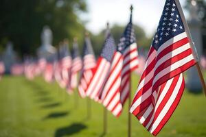 Many american flags are lined up in a row photo