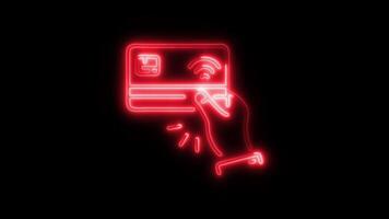 Glowing neon Debit Card icon isolated on black background motion graphic animation video