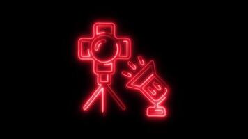 Glowing neon Studio Lighting icon isolated on black background motion graphic animation video